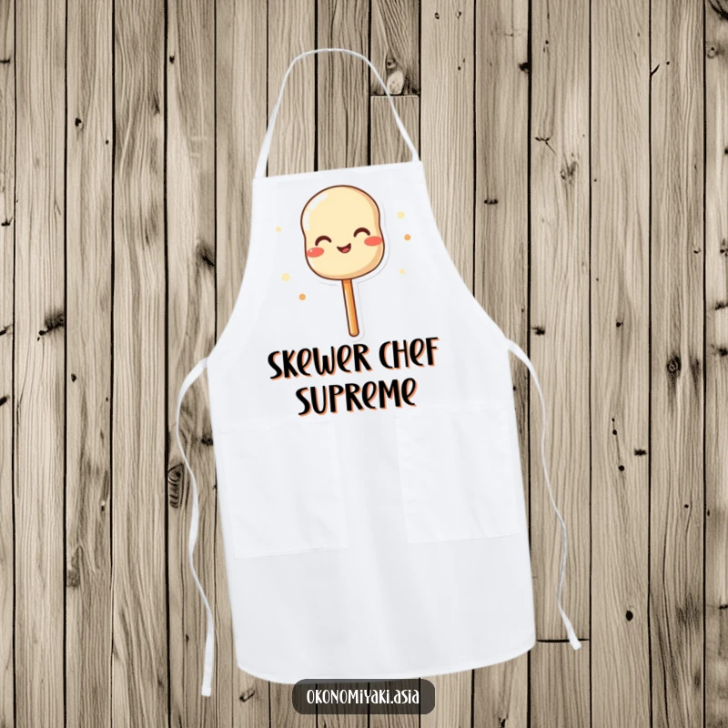 Funny apron featuring a happy dango skewer wiggling joyfully, perfect for adding cheer to cooking.